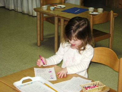 Preschooler Writing Carefully